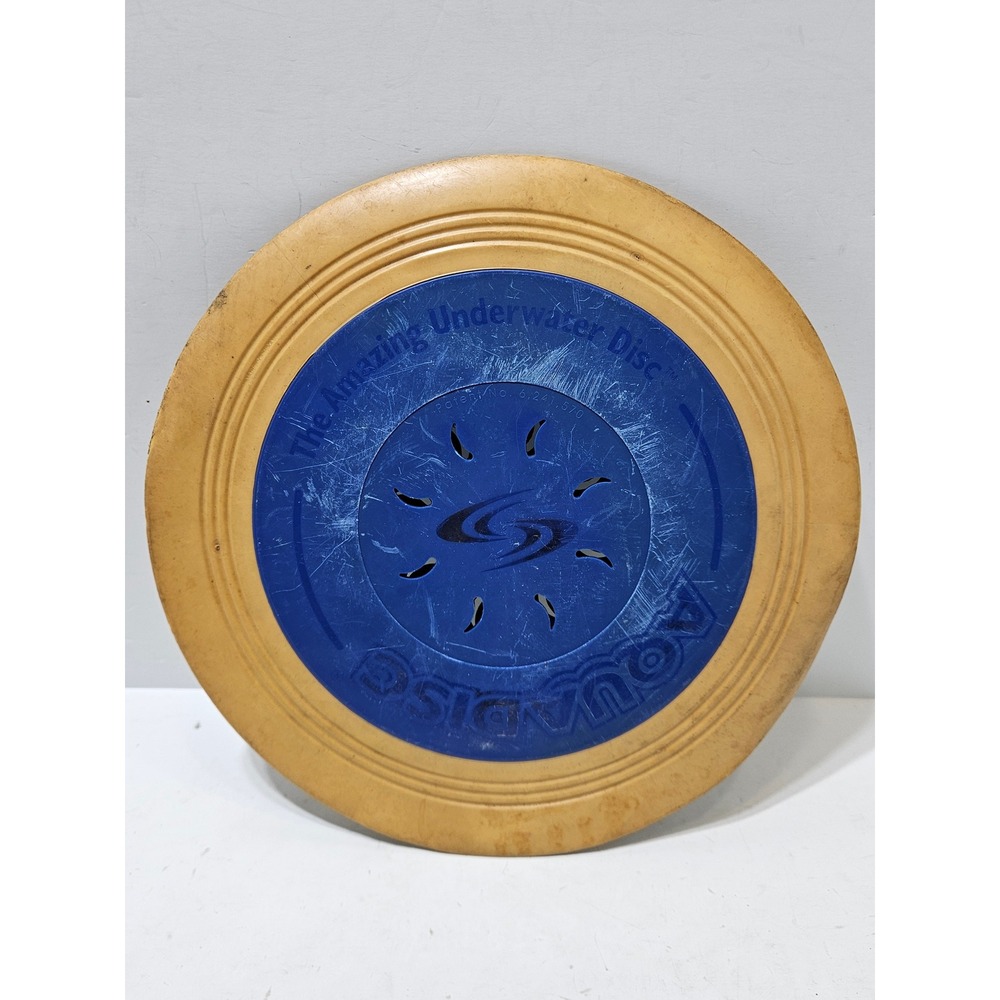 AquaDisc The Amazing Underwater Disc Flying Disc Pool Toy Blue Yellow